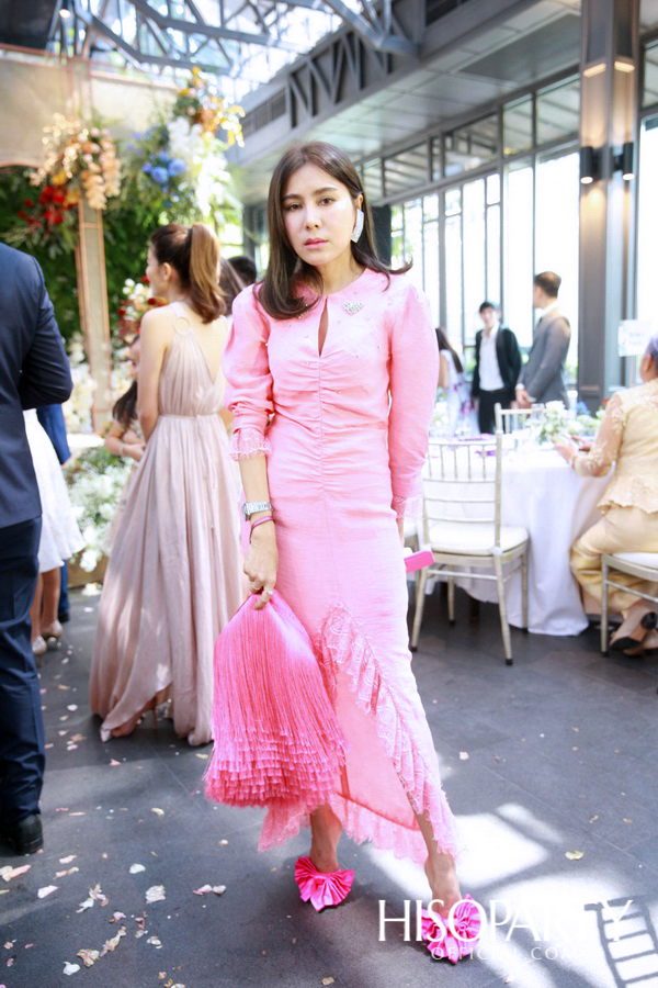 งานเลี้ยงฉลองพิธีมงคลสมรสระหว่าง กรกนก ยงสกุล และ คณิศร เปรมประเสริฐ